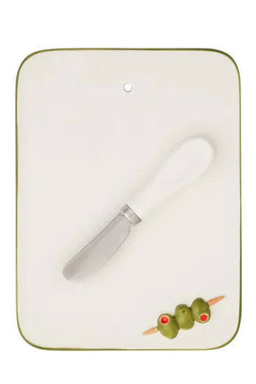 Two ceramic cutting boards with knife rests featuring fish and snake designs on a white background.